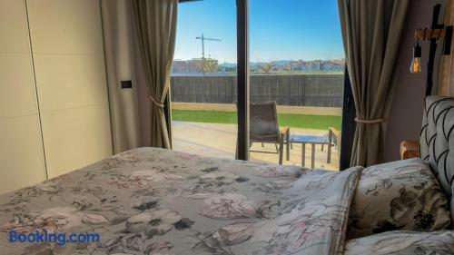Garden view through the master bedroom windows at Casa Los Narejos