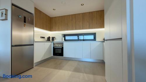 Modern kitchen with oven, hob and generous worktop space