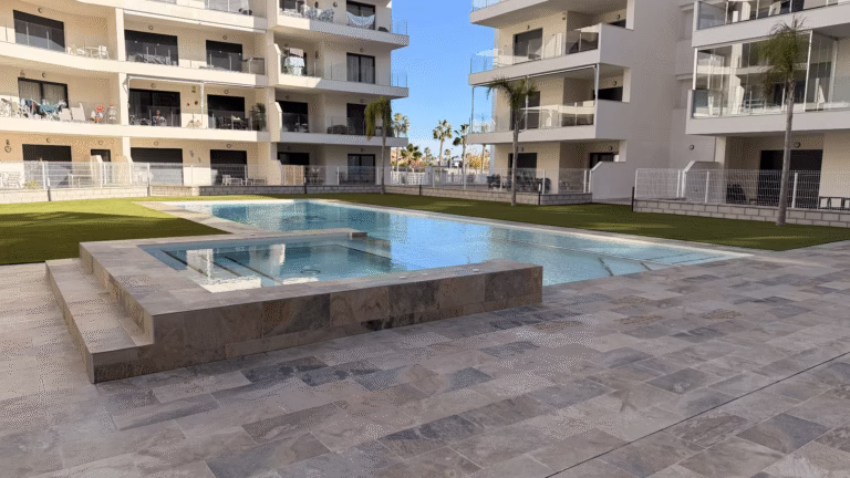 Large communal swimming pool with whirlpool and children’s pool